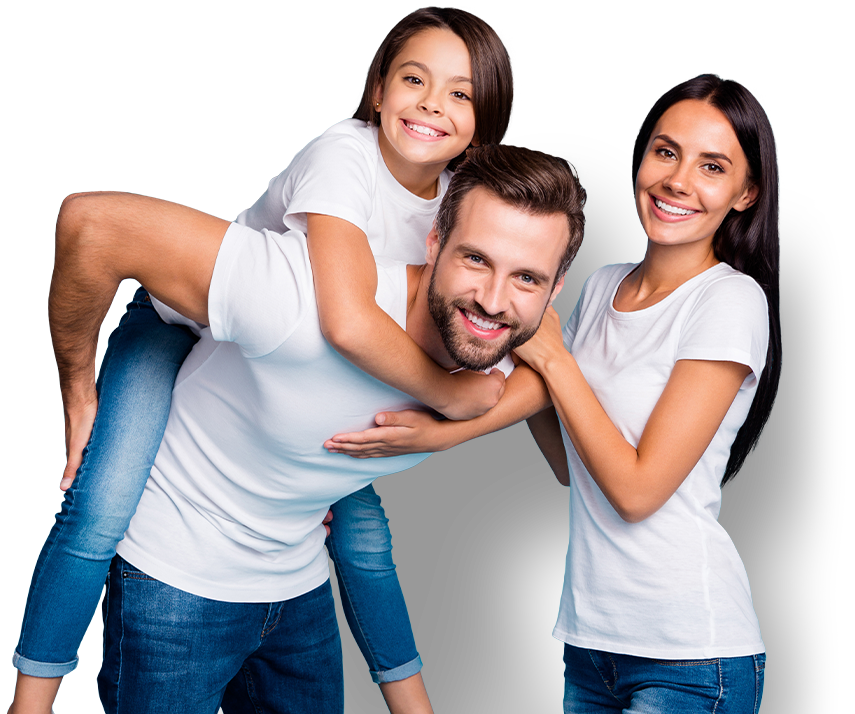 man with child on his back standing next to a woman